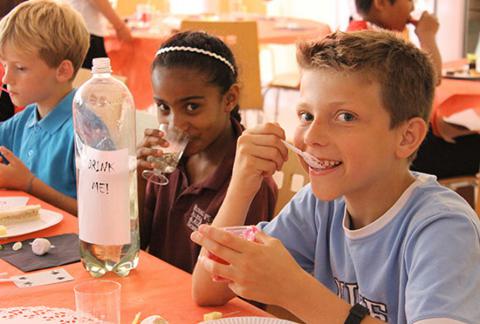 Kids smiling while eating