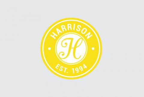 Harrison logo in yellow