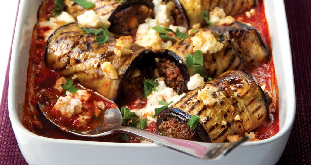 A tray of Lebanese stuffed aubergines with crumbled feta