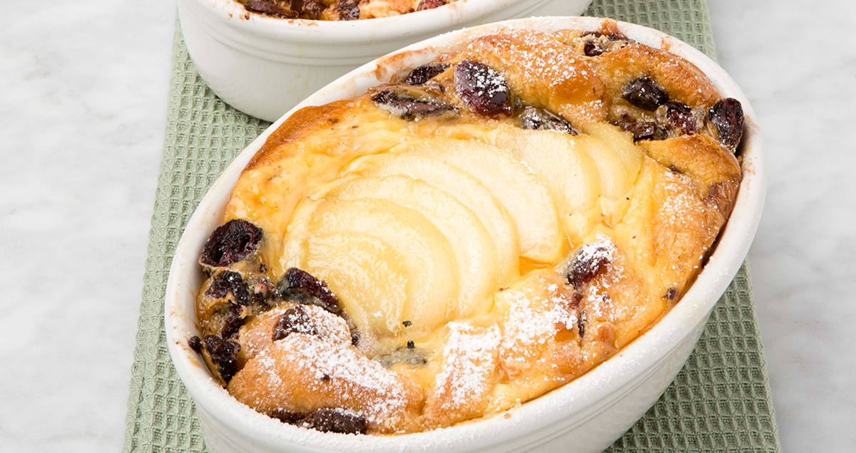 A tray of poached pear pudding