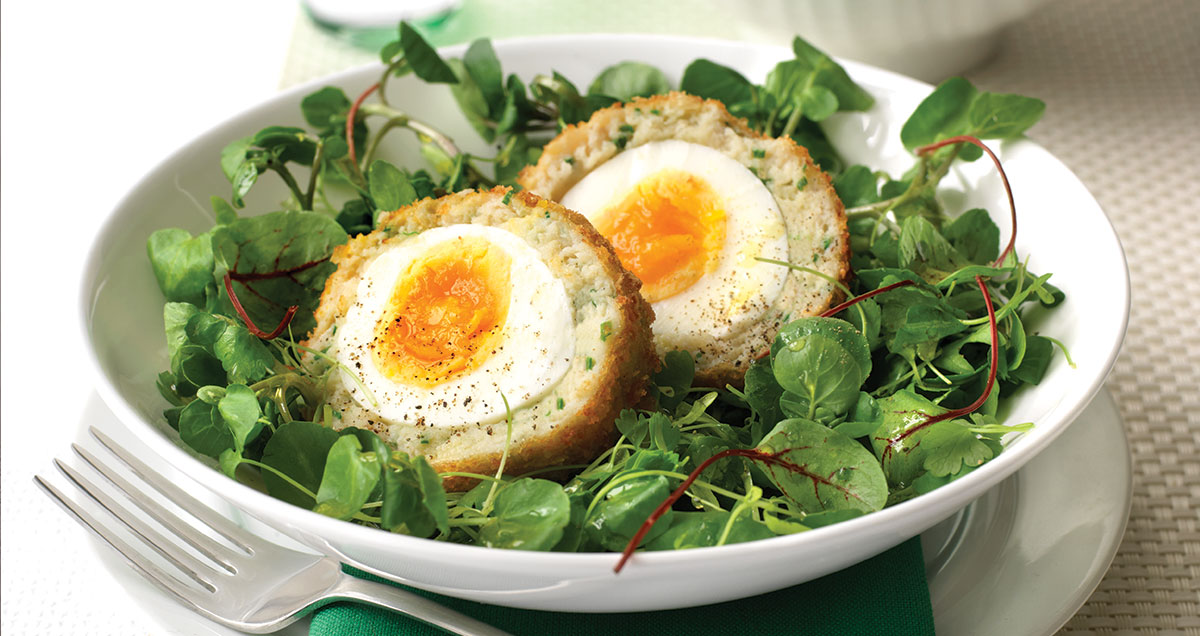 Smoked haddock scotch egg sliced in half