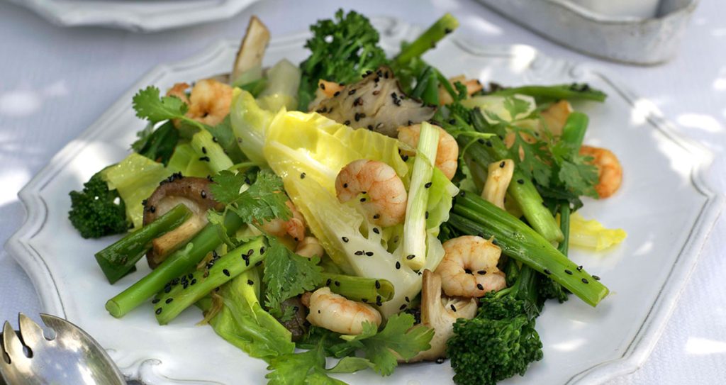 A plae of Wild garlic, spring greens, and chilli prawn stir-fry